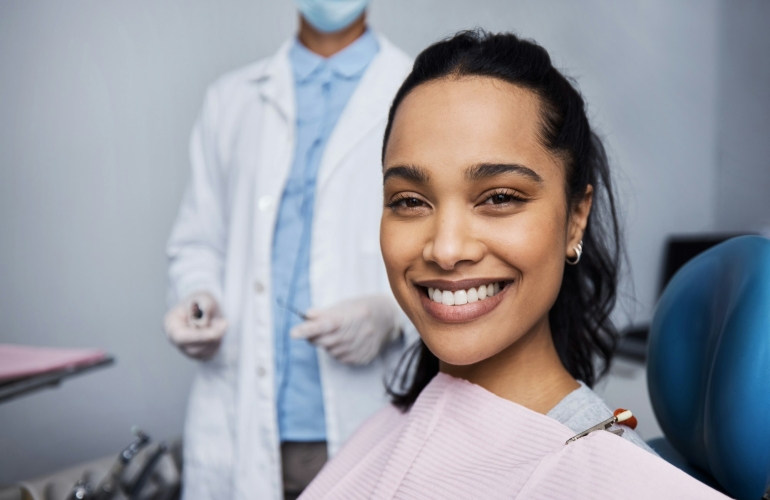 Portrait of a young woman having dental work done on her teeth